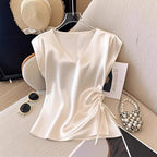 Nia | Camiseta sin mangas de seda con cuello en V.