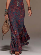 Yoana | Vestido largo retro de encaje con cuello halter y estampado floral estilo sirena.