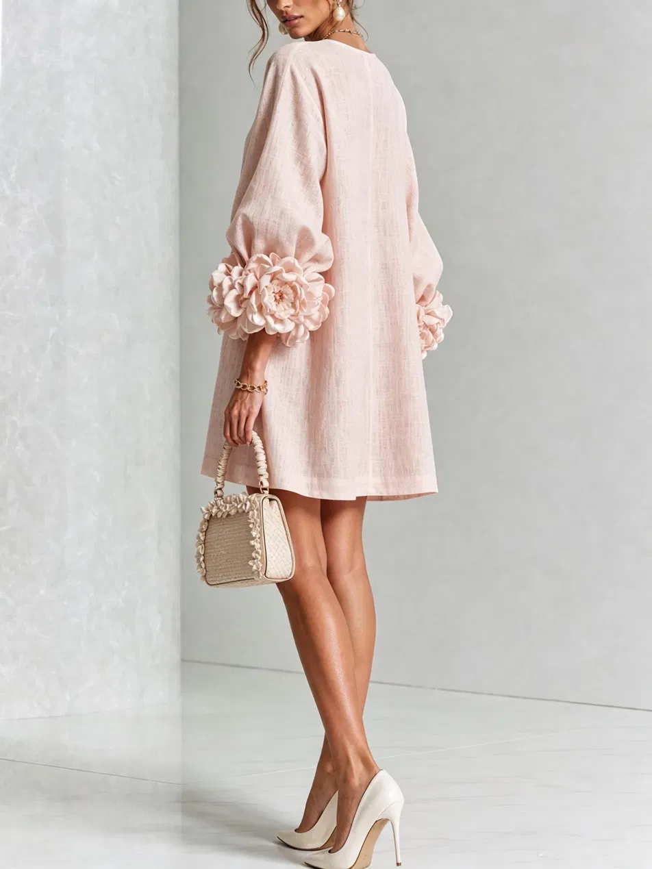 Paloma | Vestido texturizado de escote redondo y puños florales