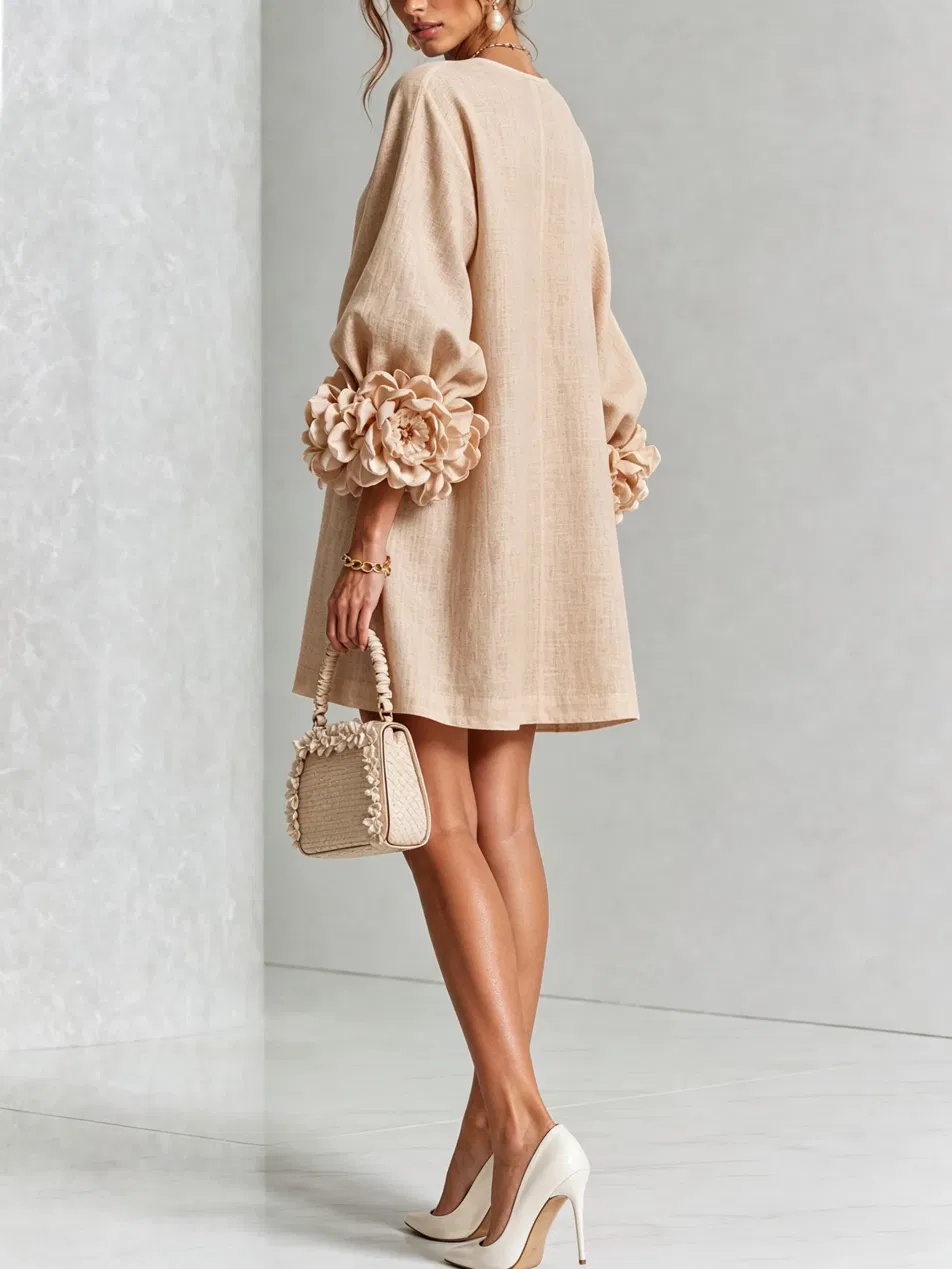 Paloma | Vestido texturizado de escote redondo y puños florales