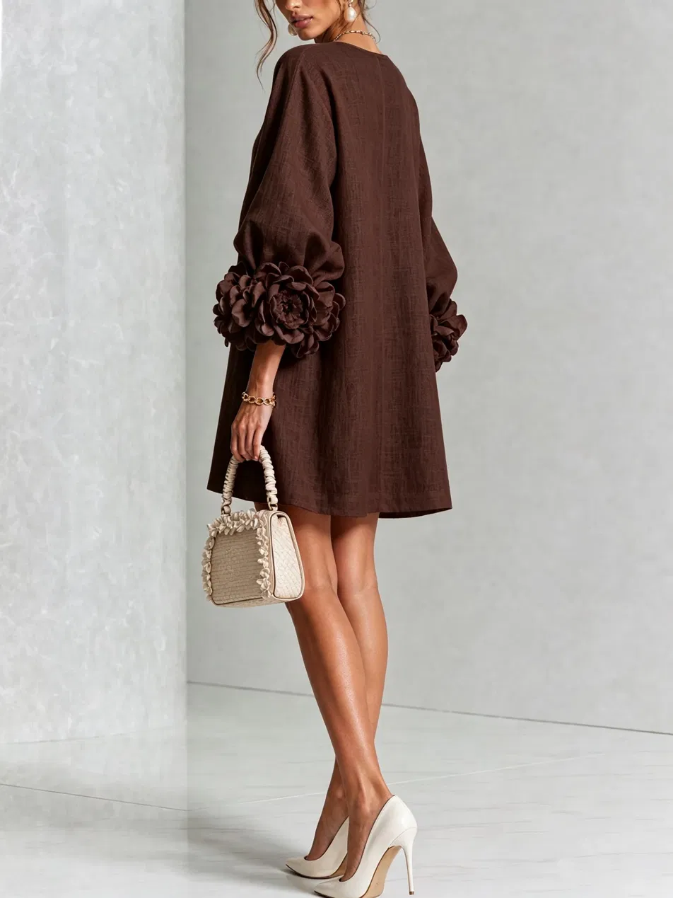 Paloma | Vestido texturizado de escote redondo y puños florales