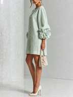 Paloma | Vestido texturizado de escote redondo y puños florales
