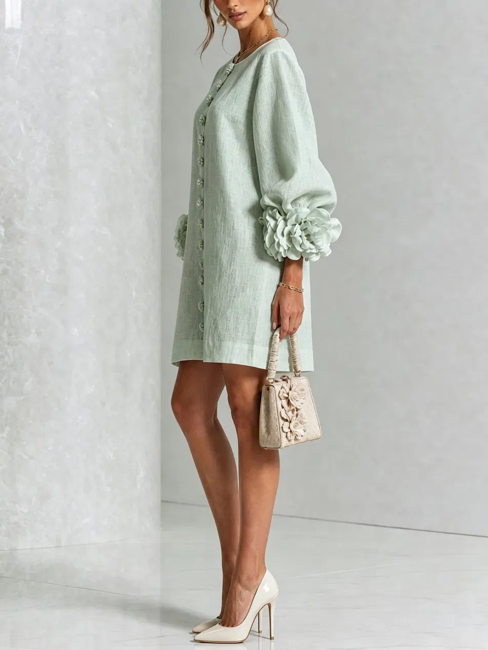 Paloma | Vestido texturizado de escote redondo y puños florales