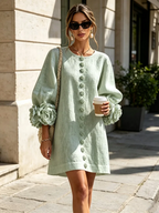 Paloma | Vestido texturizado de escote redondo y puños florales
