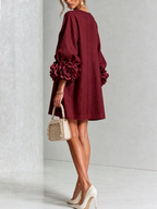 Paloma | Vestido texturizado de escote redondo y puños florales