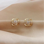 Mélodie - Boucles d'oreilles dorées en spirale avec cristaux