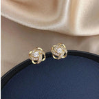 Mélodie - Boucles d'oreilles dorées en spirale avec cristaux