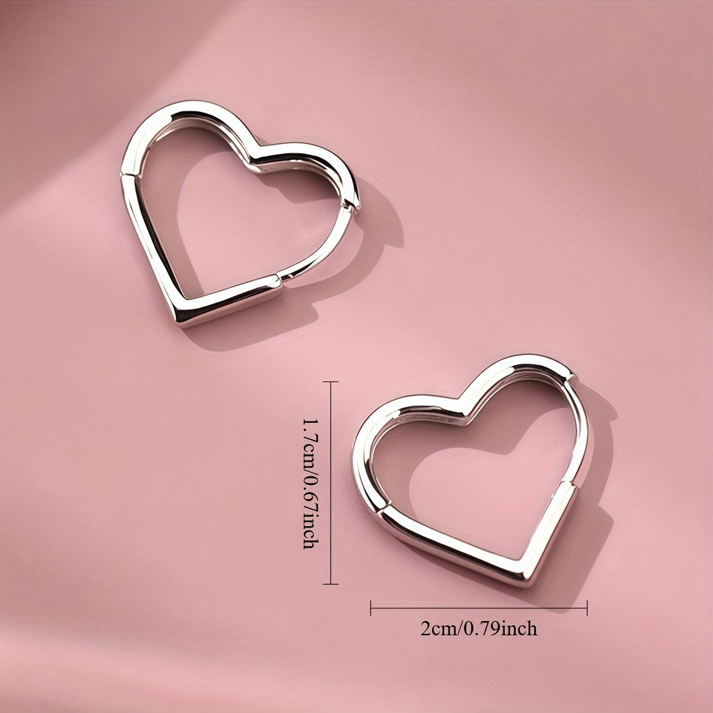 Gaëlle - Boucles d'oreilles dorées en forme de cœur en acier inoxydable