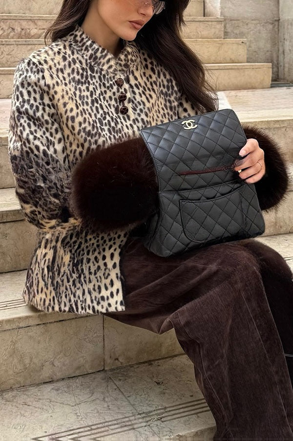 Faustine | Veste rétro en fausse fourrure imprimé animal, col montant et poignets duveteux