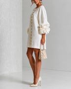 Paloma | Vestido texturizado de escote redondo y puños florales