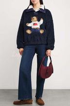 Ambre | Pull polaire rétro américain à col montant boutonné et motif ours