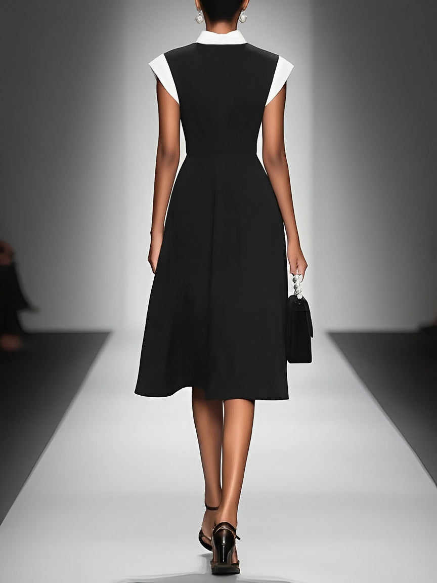 Ariane | Robe mi-longue à col carré et manches colorblock.