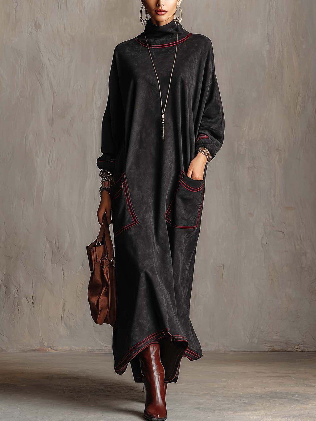 Manon | Robe longue noire à surpiqûres contrastées et poches plaquées
