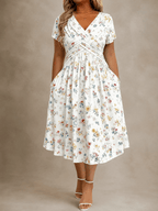 Noemí | Vestido midi floral cruzado de manga corta