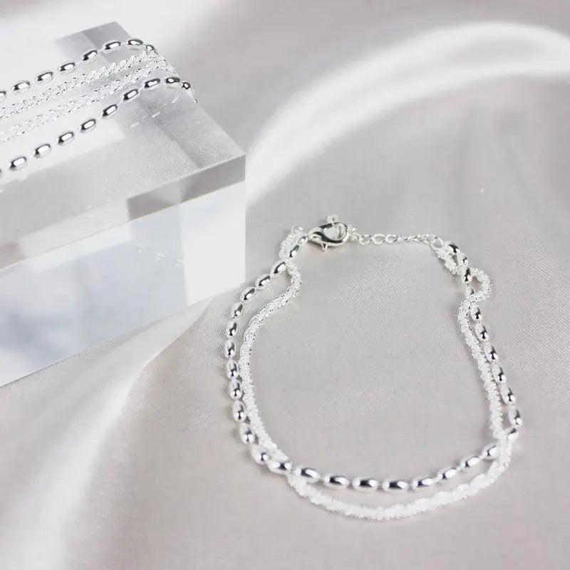 Célestine - Set de bracelets argentés élégants avec zircons