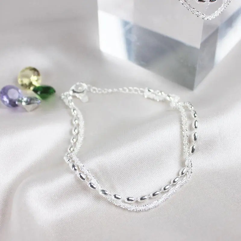 Célestine - Set de bracelets argentés élégants avec zircons