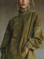Faustine | Robe en daim à franges et col roulé