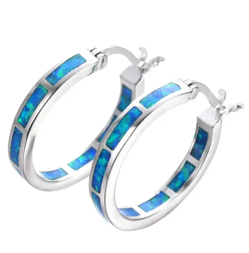 Flavie - Boucles d'oreilles chic circulaires avec opale de feu bleue