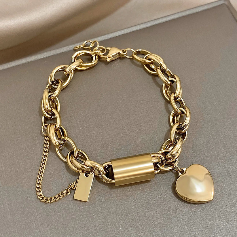 Solène - Bracelet avec breloque cœur doré