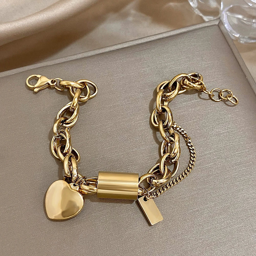 Solène - Bracelet avec breloque cœur doré