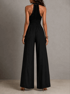 Minerva | Mono de una pieza estilo bohemio elegante con paneles de encaje negro, cintura fruncida y pernera ancha.