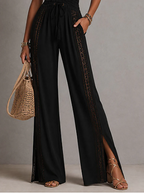 Minerva | Mono de una pieza estilo bohemio elegante con paneles de encaje negro, cintura fruncida y pernera ancha.