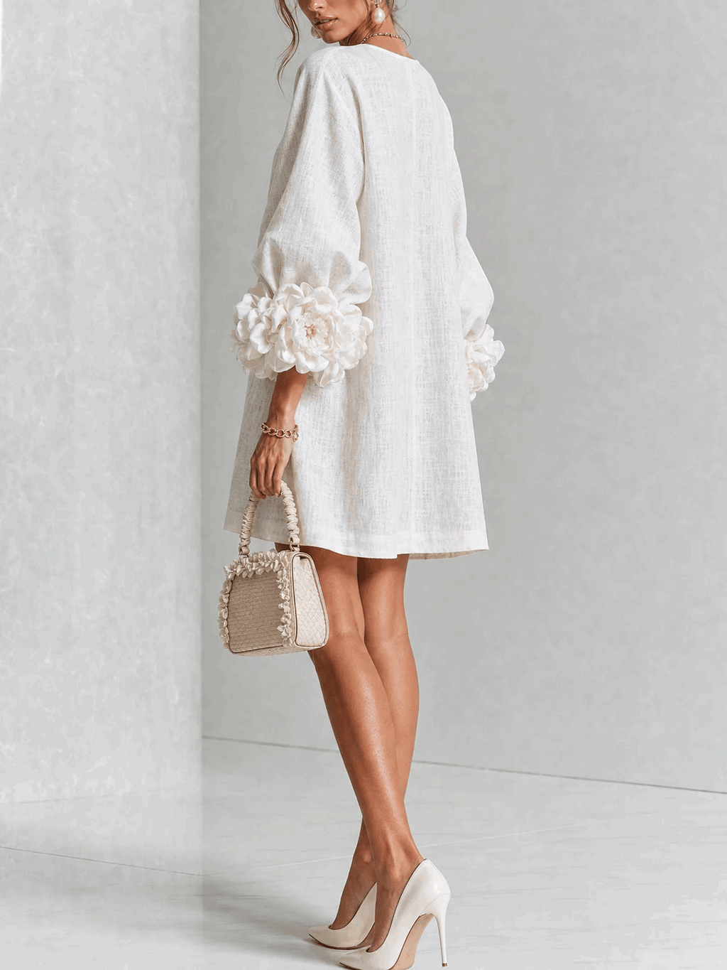 Paloma | Vestido texturizado de escote redondo y puños florales