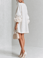 Paloma | Vestido texturizado de escote redondo y puños florales