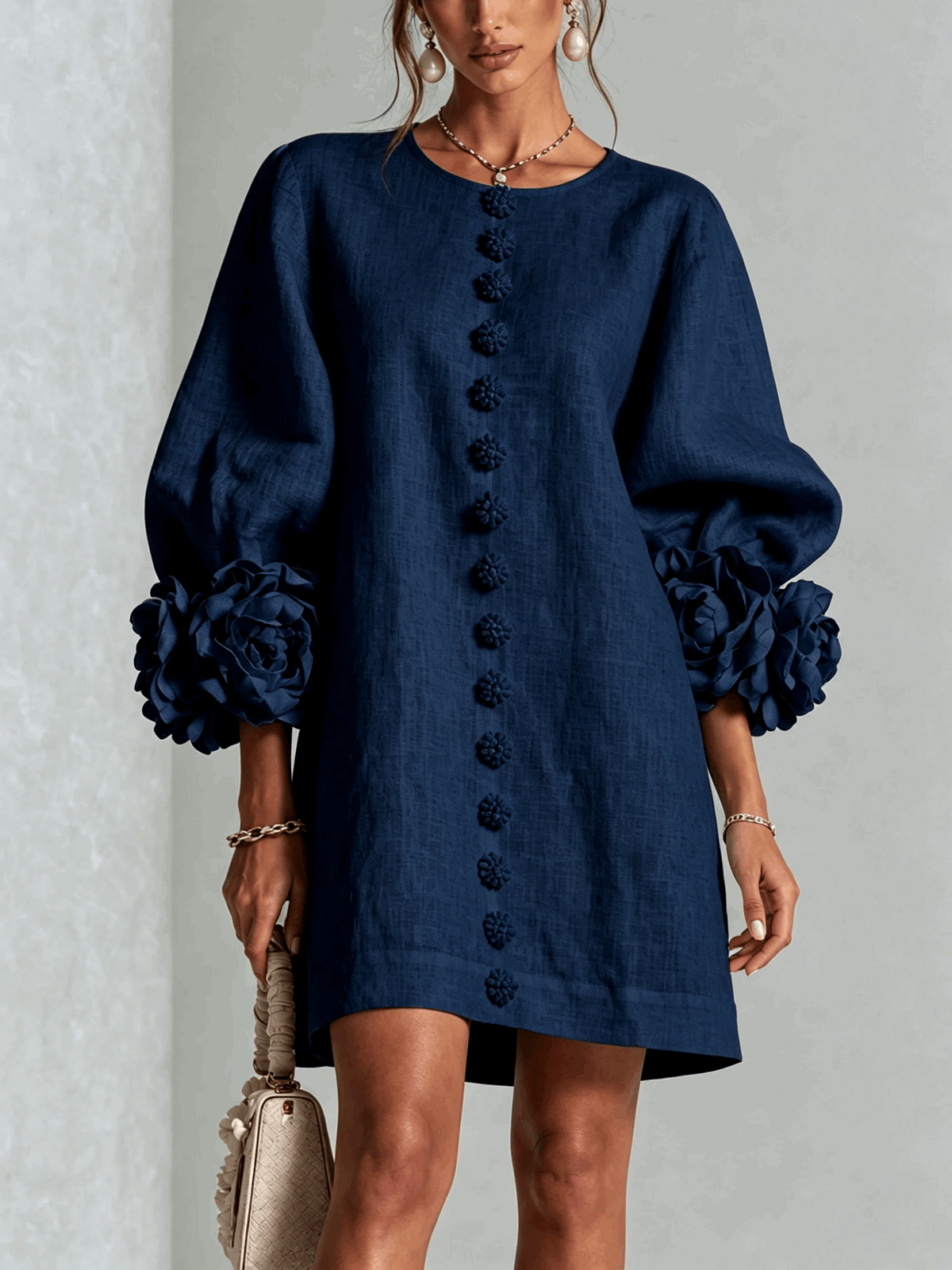 Paloma | Vestido texturizado de escote redondo y puños florales