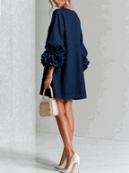 Paloma | Vestido texturizado de escote redondo y puños florales