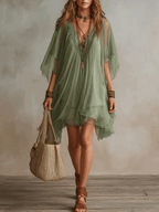 Silvia | Vestido vaporoso de encaje con mangas capa
