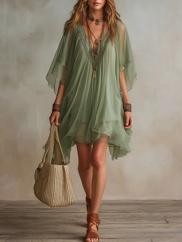Silvia | Vestido vaporoso de encaje con mangas capa