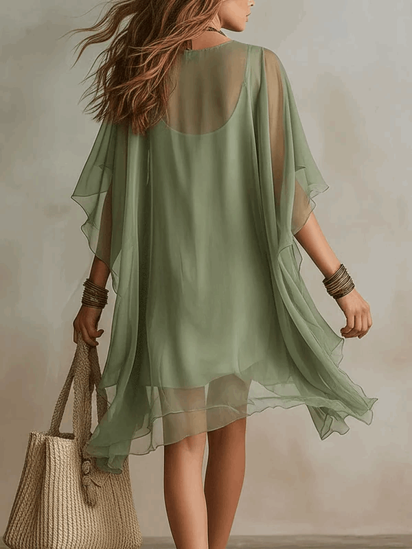 Silvia | Vestido vaporoso de encaje con mangas capa