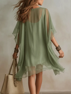 Silvia | Vestido vaporoso de encaje con mangas capa