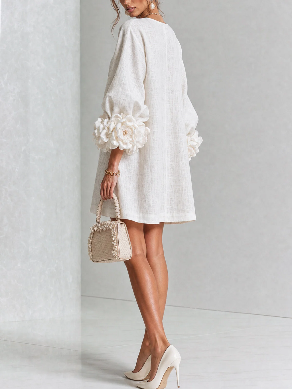 Paloma | Vestido texturizado de escote redondo y puños florales
