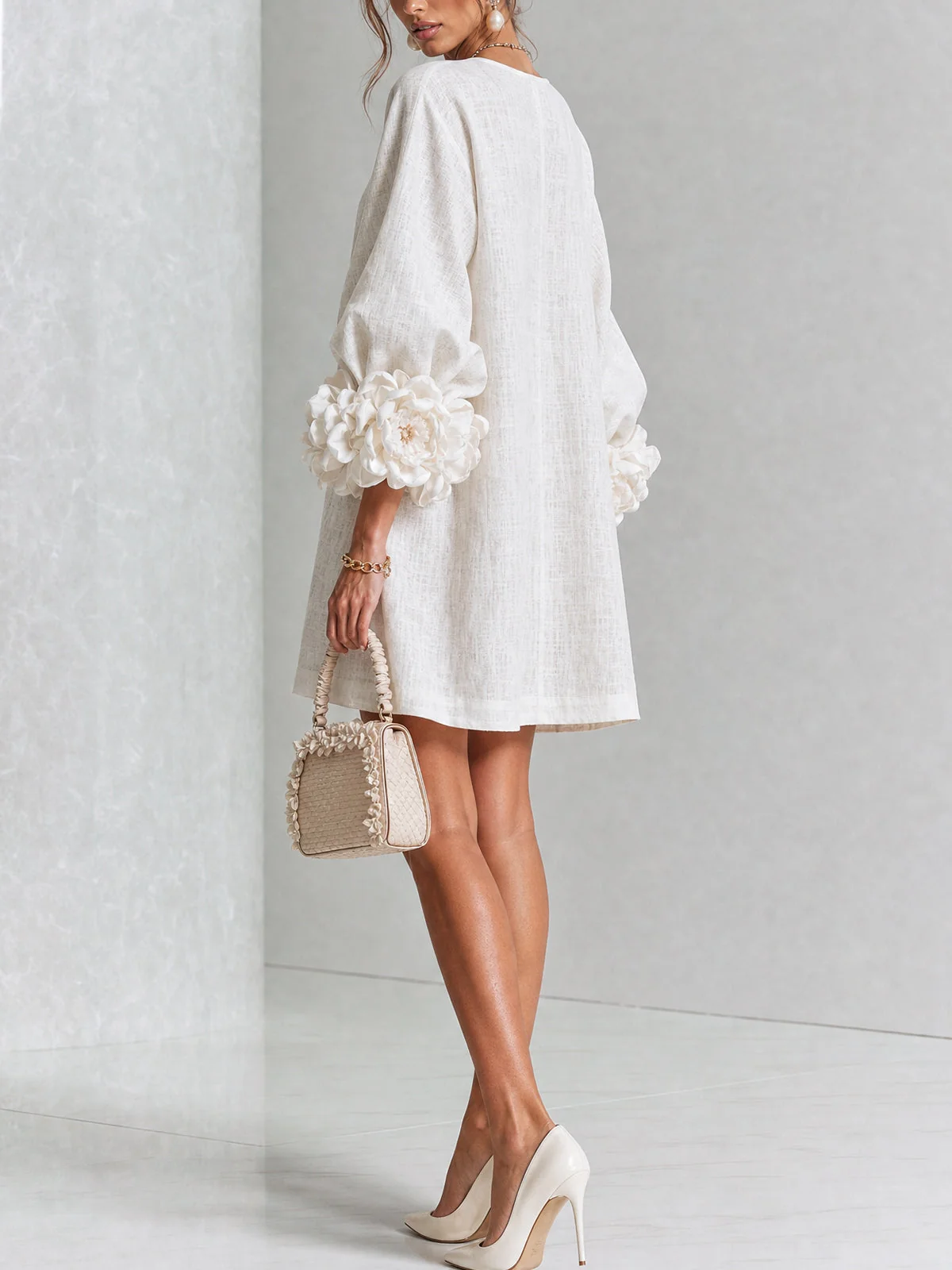 Paloma | Vestido texturizado de escote redondo y puños florales