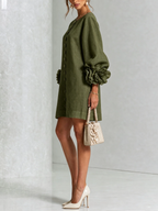 Paloma | Vestido texturizado de escote redondo y puños florales