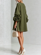 Paloma | Vestido texturizado de escote redondo y puños florales