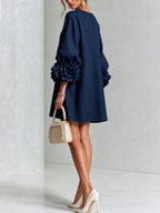 Paloma | Vestido texturizado de escote redondo y puños florales